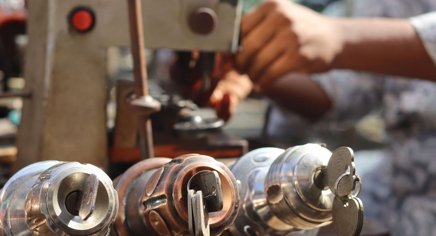 Cylinders being pinned to a keying schedule on a workbench