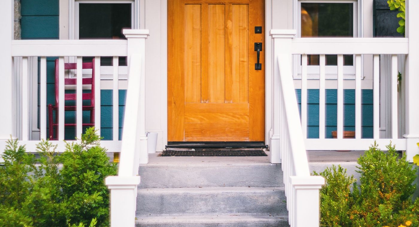 A new fiberglass entry door with sidelights on a metro Atlanta home