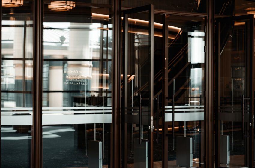 Glass doors and a glazed lobby of a corporate building
